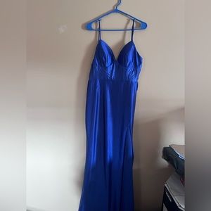 Blue sparkly form fitting prom dress